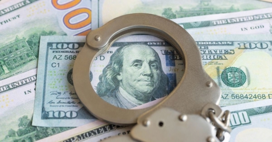 money and handcuffs